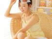 俏皮丸子头邻家美眉醉人甜笑吊带短裤秀白嫩牛奶肌图片